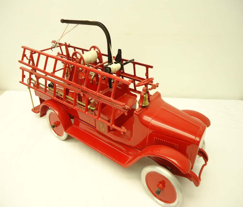 ABT: Great Buddy L #205 Fire Truck (R): Paul V. Ambrose and Drew J. Bauer present: This is the repainted #205 Fire Truck that Buddy L made sometime long ago. The body measures approx. 27-inches long; no Box. Please add $30.00 for US-48 Ship