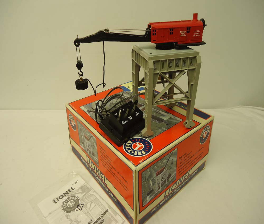 ABT: Lionel #14134 282R Triple Action Magnet Crane: Paul V. Ambrose and Drew J. Bauer present: This is the Lionel #14134 282R Triple Action Magnet Crane that Lionel made a few years ago. Our Opinion is that it is generally in Like New Condition. A Nice