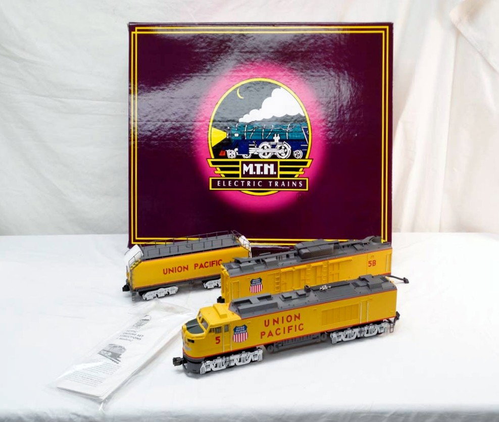 ABT: MTH #MT-2124LP Union Pacific Gas Turbine 3 Pi: Paul V. Ambrose and Drew J. Bauer present: This is the #MT-2124LP Union Pacific Gas Turbine Three Piece Engine Set that MTH made in O Gauge a few years ago. This Set features four Motors, Smoke, Const