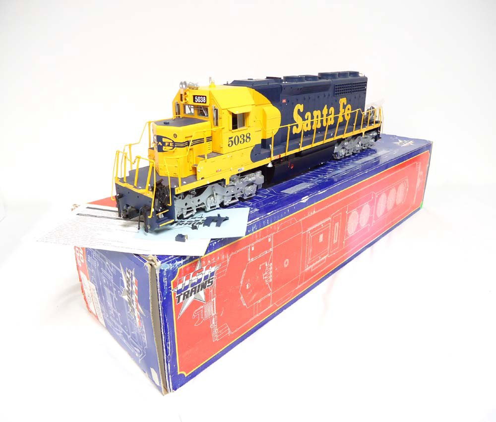 ABT: USA Trains G Scale: Santa Fe SD40-2 Engine/OB: Paul V. Ambrose and Drew J. Bauer present: This is the Santa Fe SD40-2 Engine that USA Trains made for G Scale a few years ago. (broken plastic pieces from body of train in box). Original Box. Please