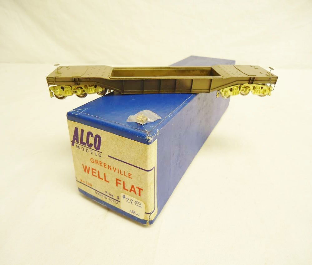 ABT: Alco Model HO Brass: Well Flat Car/OB: Paul V. Ambrose and Drew J. Bauer present: This is the Well Flat Car that Alco Model made in HO Scale a few years ago. Please look at all the pictures; what is pictured is what you will receive. Origi