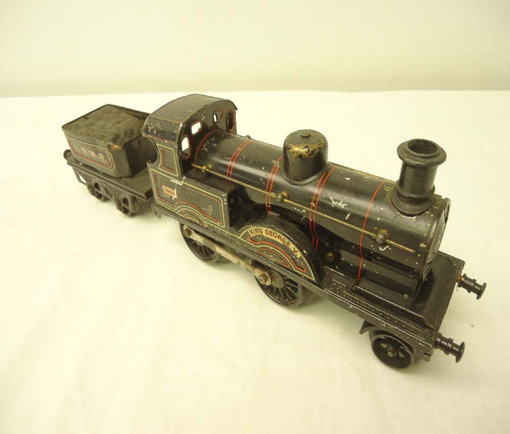ABT: Early Bing 1 Gauge #1902 LNWR Clockwork Steam: Paul V. Ambrose and Drew J. Bauer present: These are the #1902 LNWR 'King George V' Clockwork Steam Engine and Tender that Bing made in 1 gauge circa the early 1900s. Examine the pictures carefully. O
