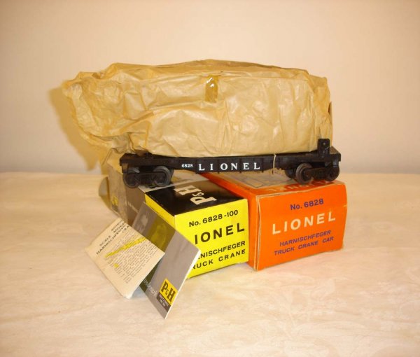 ABT: Great Lionel #6828 P&H Crane/Brick Pix OB: Paul V. Ambrose and Drew J. Bauer present: This is the #6828 P&H Crane Kit that Lionel made in the early 1960s. Looks complete to us, includes the Instruction Sheet, Envelopes and Inner Box. Our Opini