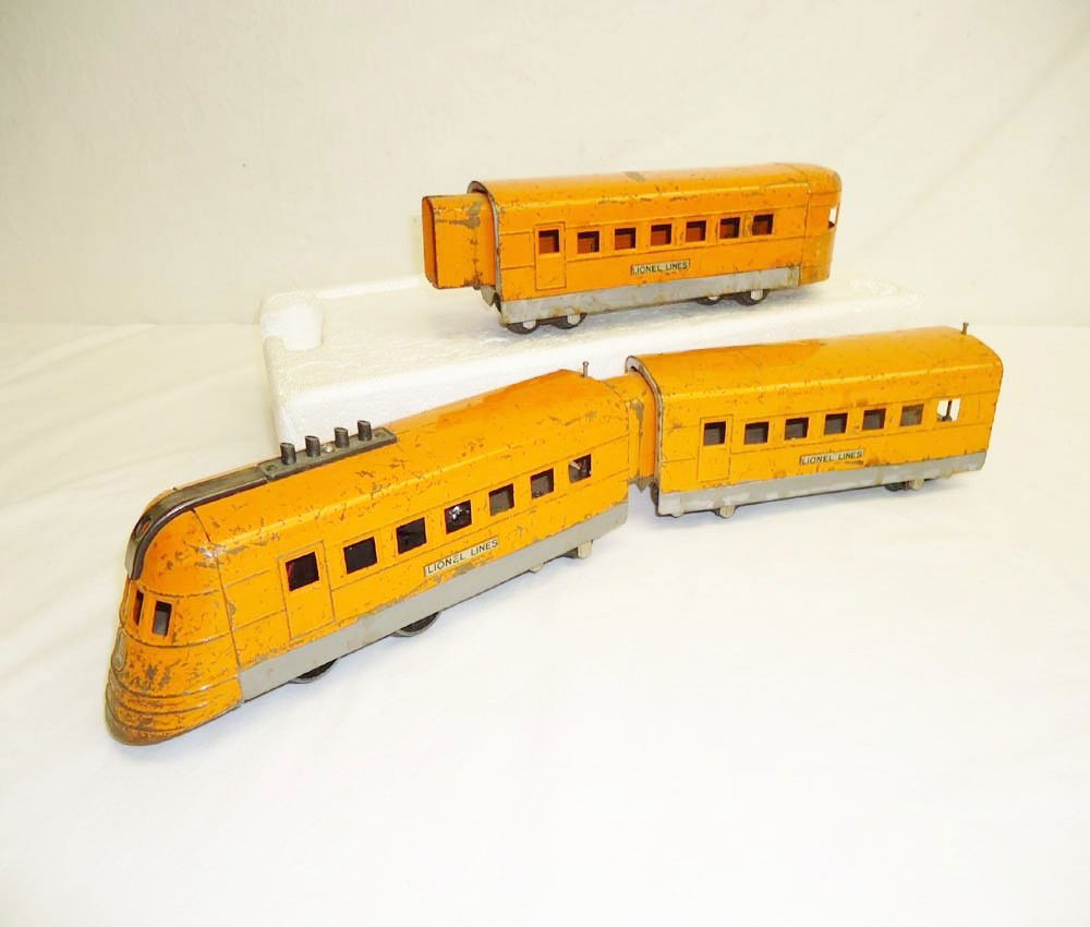 ABT: Rare Lionel #1700E Hiawatha Orange/Gray 3 Piec: Paul V. Ambrose and Drew J. Bauer present: This is the very scare and uncatalogued #1700E three piece 027 Streamlined Set in the Hiawatha Orange & gray Colors that Lionel made in the middle 1930s. Our