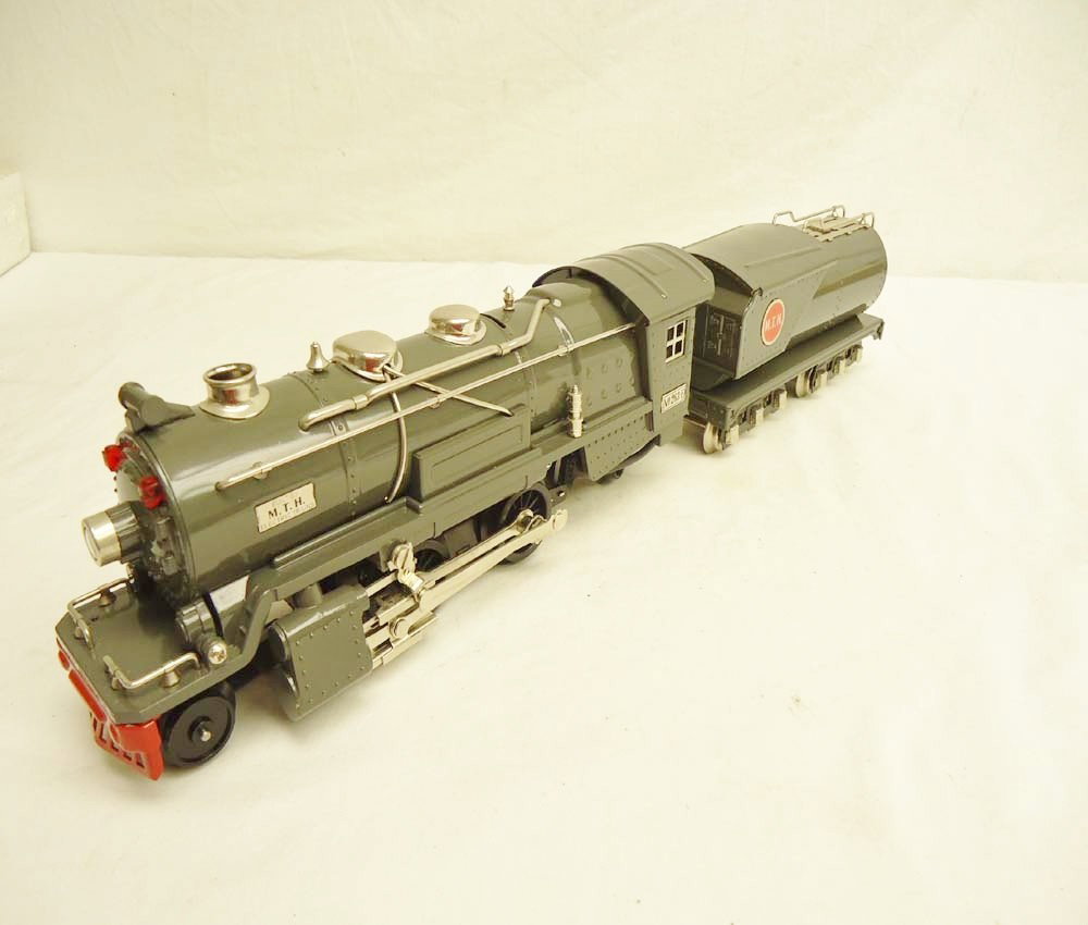 ABT: MTH #263E Gunmetal Steam Engine & Tender: Paul V. Ambrose and Drew J. Bauer present: These are the #263E Gunmetal Steam Engine and Tender that MTH made in the recent past in O gauge as a remake of the Lionel items from the 1930s. Protosounds.