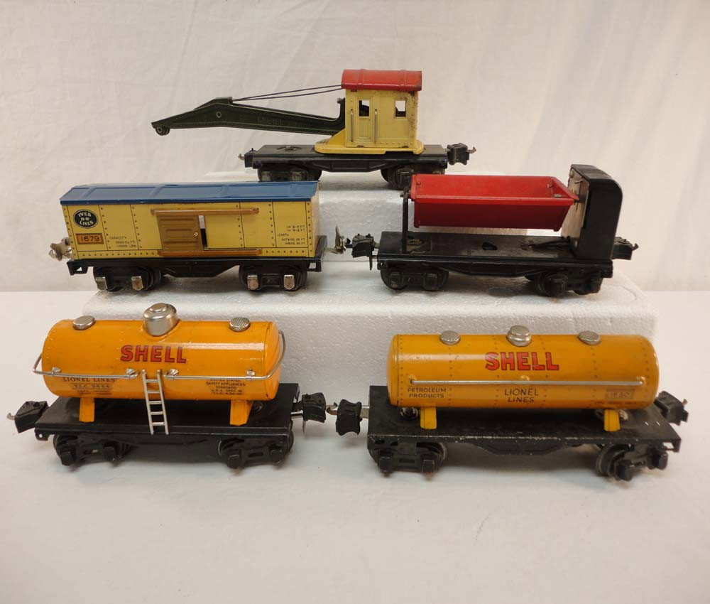 ABT: 5 Assorted Lionel/Ives Rolling Stock Items: Paul V. Ambrose and Drew J. Bauer present: These are the #2660 Crane, #2654 Tank Car #1680 Tank Car and #3659 Dump Car that Lionel made, and the #1679 Box Car that Ives made in O gauge Pre War. What y