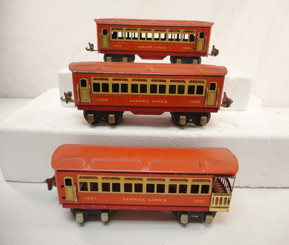 ABT: Lionel/Ives #1690 (2) & #1691 O Gauge Passeng: Paul V. Ambrose and Drew J. Bauer present: These are two #1690 and #1691 Passenger Cars Lionel/Ives made in O gauge circa the early 1930s. No Boxes. Please add $15.00 for US-48 Shipping and Insurance.
