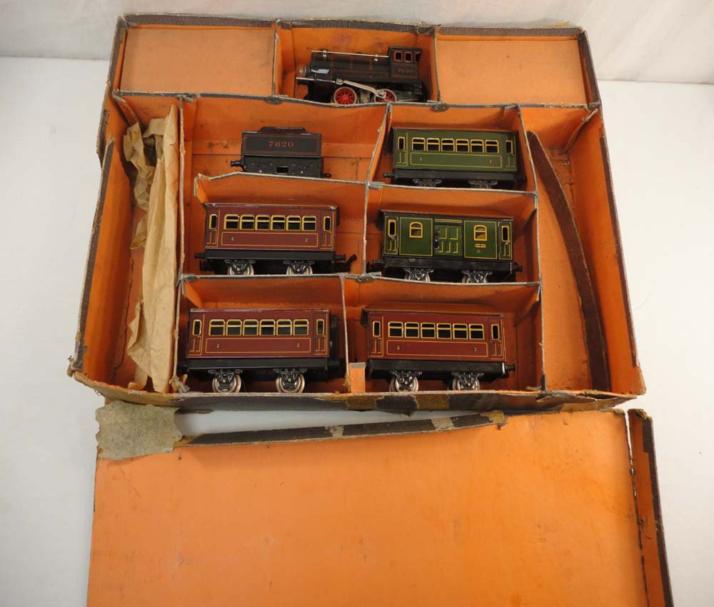 ABT: Unusual Bing O Gauge Steam Passenger Set: Paul V. Ambrose and Drew J. Bauer present: This is an unusual Steam Passenger Set that Bing made in O gauge circa the 1930s. Included are the #7820 Electric Steam Engine and Tender, Baggage Car, plus 