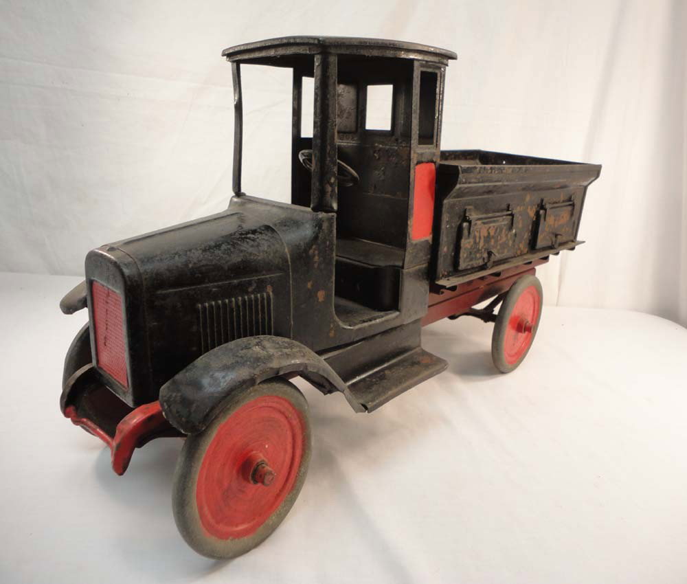 ABT: Amazing Old Black Pick-Up Truck: Paul V. Ambrose and Drew J. Bauer present: This is a great old Pickup Truck by an unknown Maker from time long ago. It measures 25 inches in length and 12 inches in height. Please add $20.00 for US-48