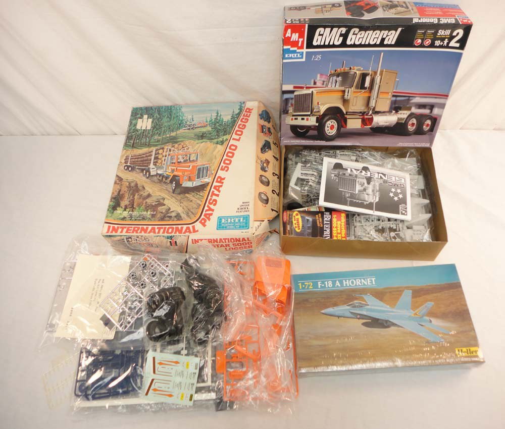 ABT: Heller/Ertl: #80338/30060/8014 Kits/OBs: Paul V. Ambrose and Drew J. Bauer present: These are the #80338 F-18 Hornet, the #30060 GMC General, and the #8014 Logger Kits that Heller/Ertl made in 1/25 and 1/72 Scale a few years ago. Please look