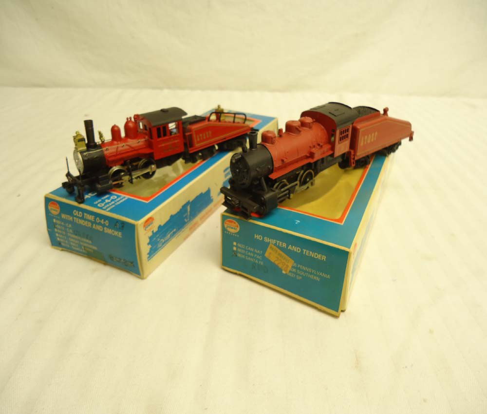 ABT: Model Power Ho Scale: #6619/6634 Santa Fe Eng: Paul V. Ambrose and Drew J. Bauer present: These are the #6619/6634 Santa Fe Engines and Tenders that Model Power made in HO Scale a few years ago. Please look at all the pictures; what is pictured is