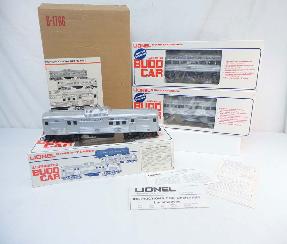 ABT: Lionel #1766 B&O 3 Piece Budd SSS Set/OB: Paul V. Ambrose and Drew J. Bauer present: This is the #1766 Baltimore & Ohio Budd Set that Lionel made in 1977 as that year's exclusive service station set. Includes the #8766 Powered Baggage and the