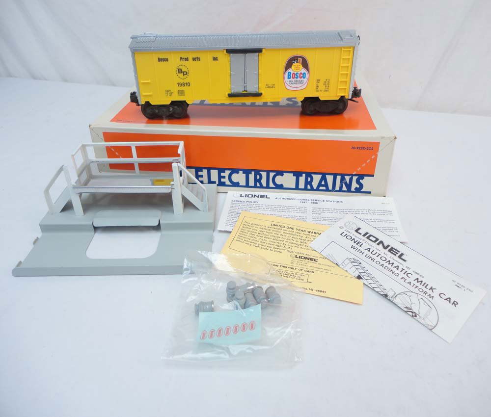ABT: Mint Lionel #19810 Operating Bosco Milk Car S: Paul V. Ambrose and Drew J. Bauer present: This is the #19810 Operating Bosco Milk Car Set with Platform that Lionel made in the 1990s. Our Opinion is that it is generally in Mint Condition. Original