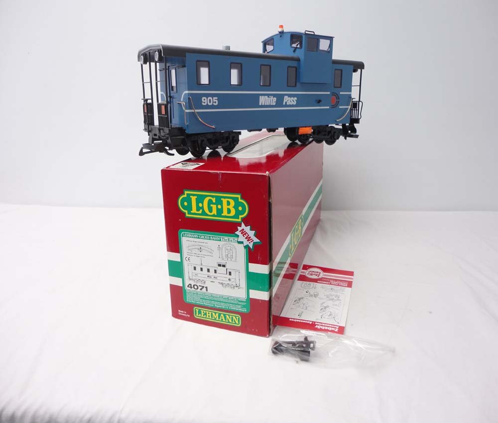 ABT: LGB G Scale: #4071 White Pass Caboose/OB: Paul V. Ambrose and Drew J. Bauer present: This is the #4071 White Pass Caboose that LGB made for G Scale a few years ago. Our Opinion is that it is generally in Like New Condition. Original Box. All