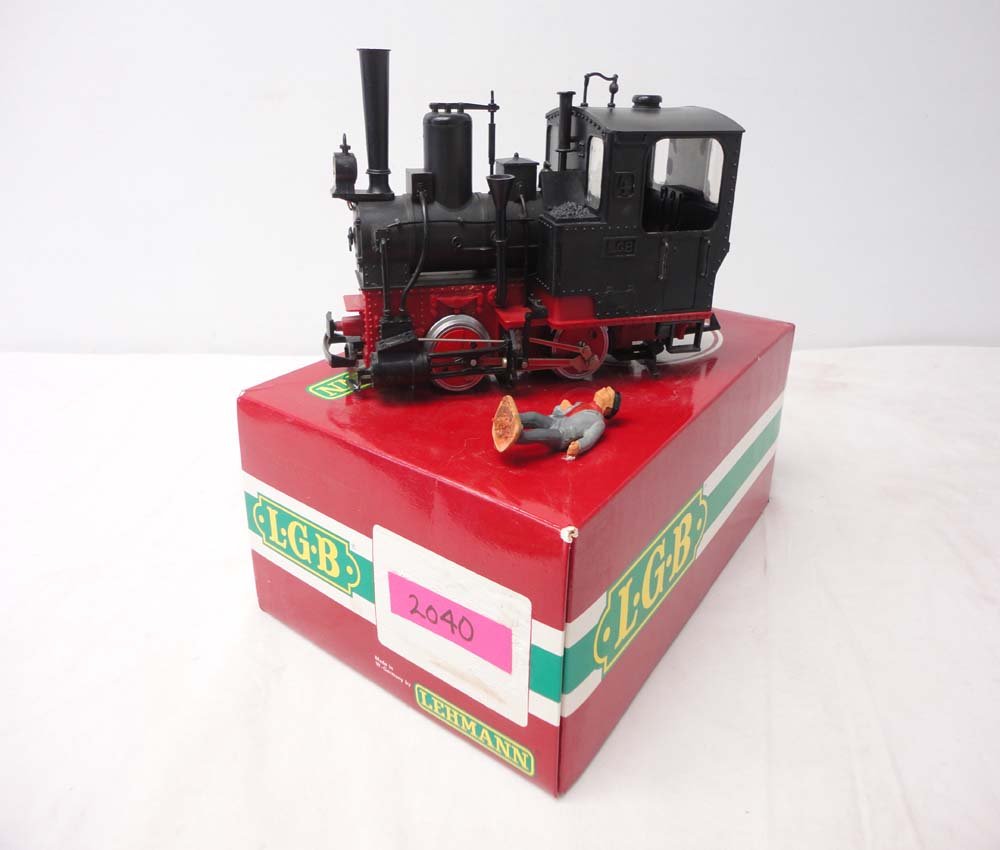 ABT: LGB G Scale: #2040 Black 0-4-0 Steam Engine/OB: Paul V. Ambrose and Drew J. Bauer present: This is the #2040 Engine that LGB made for G Scale a few years ago. Our Opinion is that it is generally in Like New Condition. Original Box. All Original in