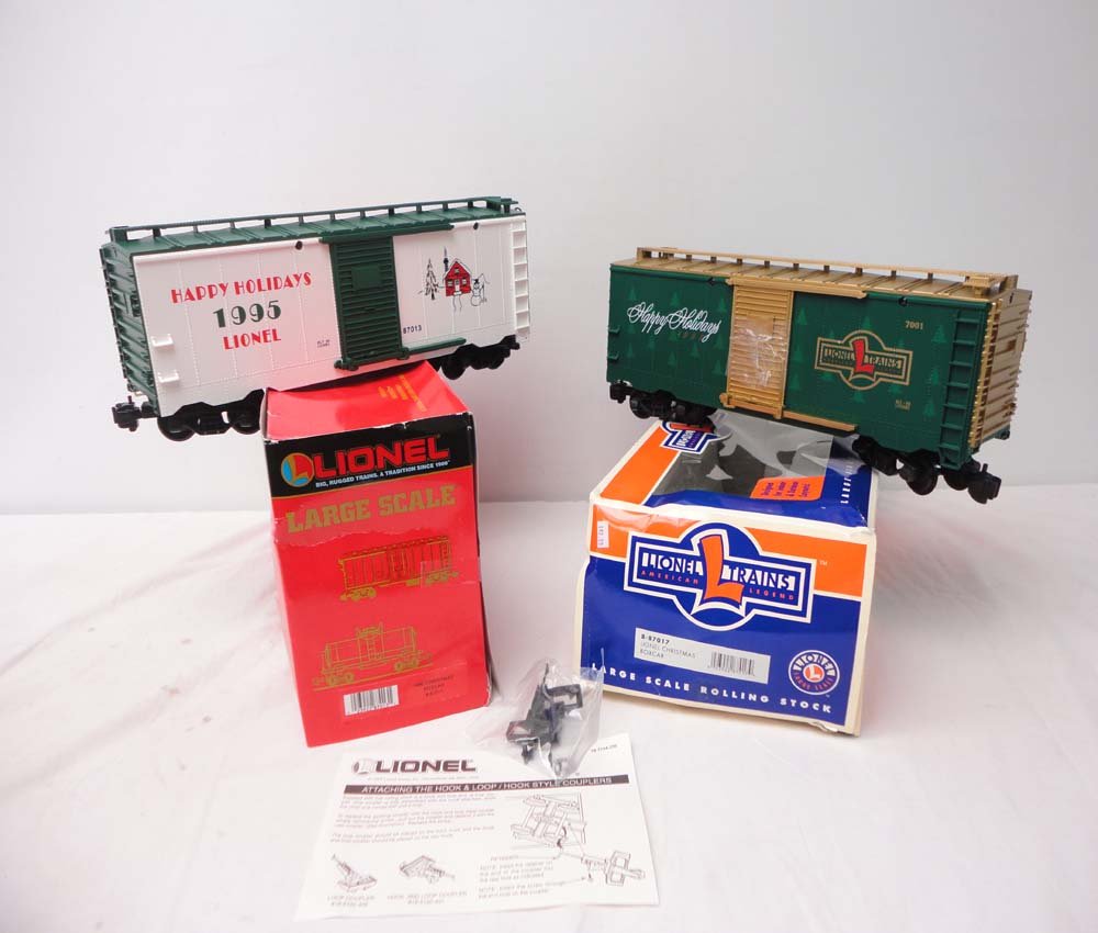ABT: Lionel G Scale: #87013 & #87017 Happy Holiday: Paul V. Ambrose and Drew J. Bauer present: These are the #87013/87017 Happy Holiday Box Cars that Lionel made for G Scale a few years ago. Our Opinion is that they are generally in Mint Condition. Ori