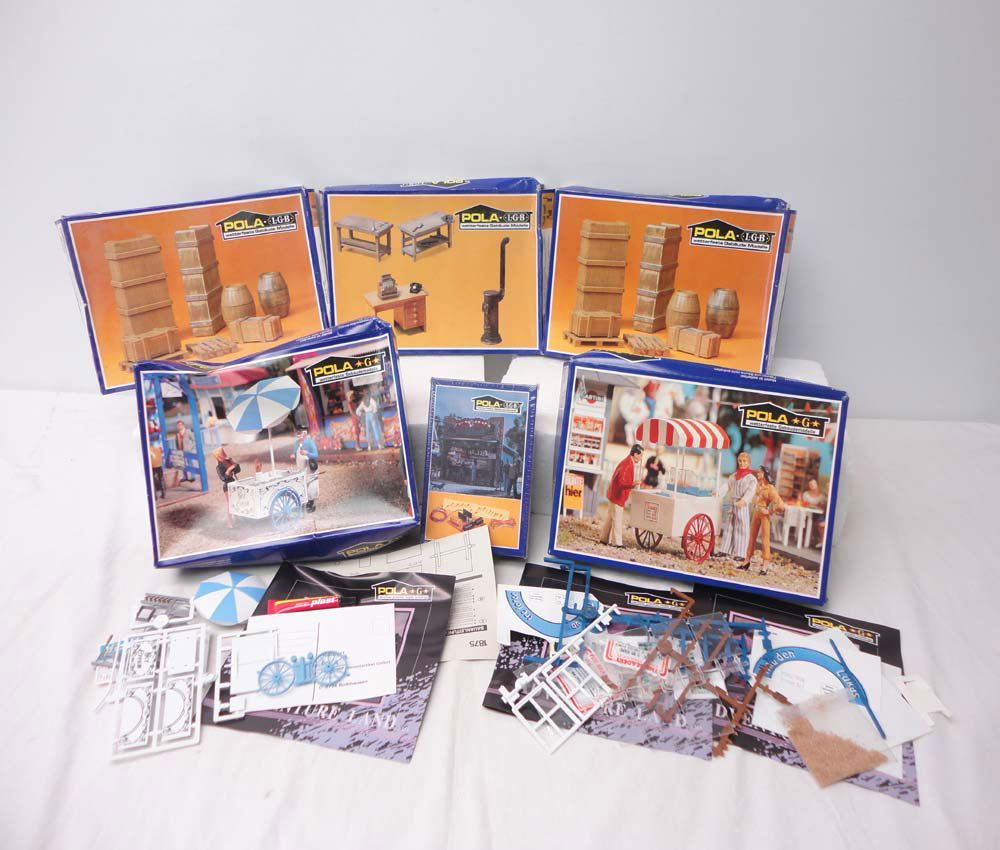 ABT: Pola/LGB G Scale: #1875/1874/974/950/961 Acce: Paul V. Ambrose and Drew J. Bauer present: These are the #1875 Ice Salesman, the #1874 Popcorn Van, the #974 Circulating Lights, two #950 Assortment of Loads, and the #961 Furnishing Equipment Accesso