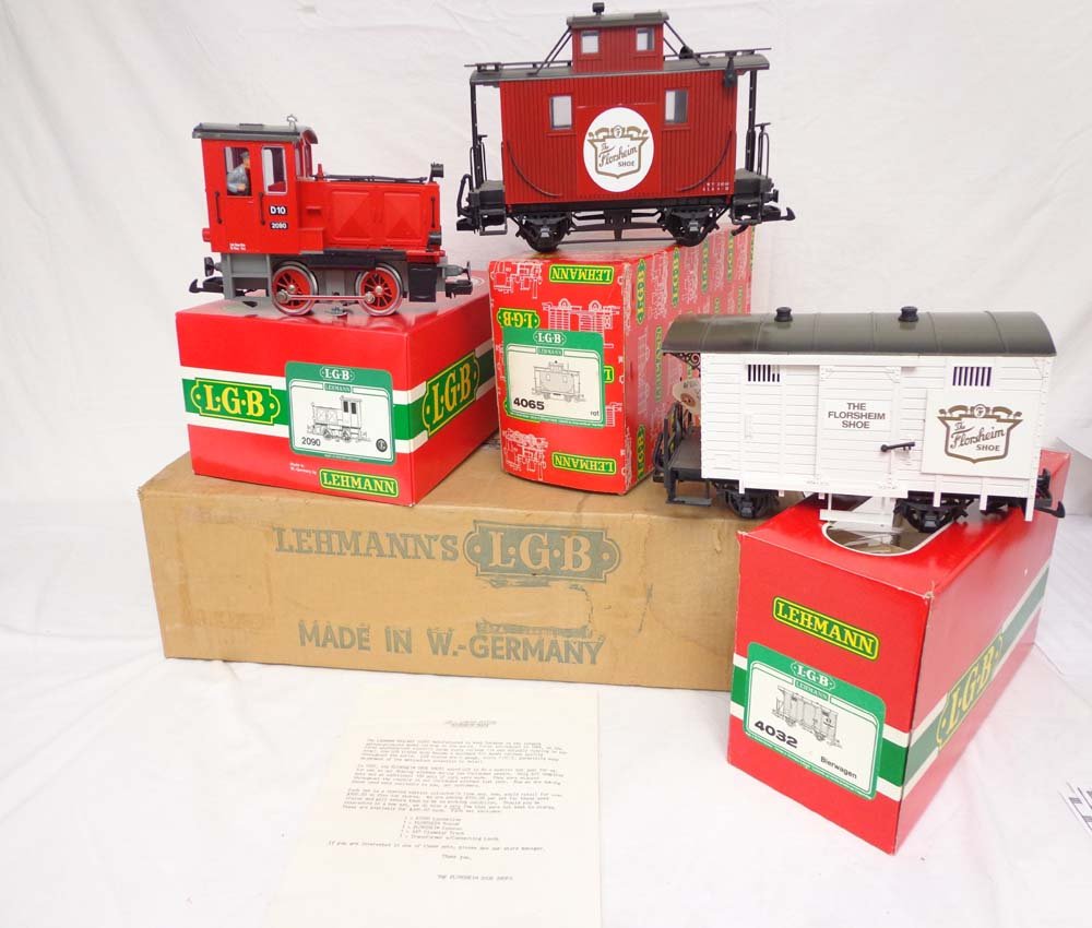 ABT: LGB G Scale: #2090/4032/4065 Florsheim Shoe E: Paul V. Ambrose and Drew J. Bauer present: These are the Florsheim Shoe #2090 Engine and the #4032/4065 Box Cars that LGB made in G Scale a few years ago as a special set. Our Opinion is that they are