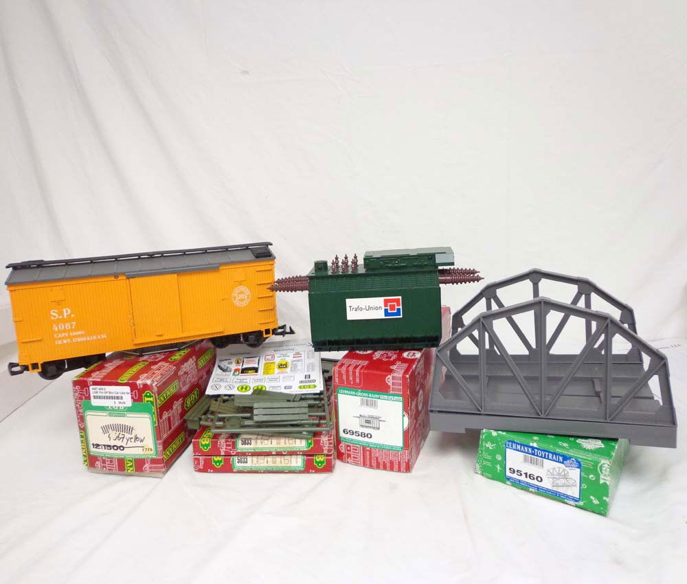 ABT: LGB G Scale: #4067/69580/295160/5033 Car & Ac: Paul V. Ambrose and Drew J. Bauer present: These are the #4067 Southern Pacific Box Car, the #69580 Trafu-Union Transformer the #295160 Bridge, and two #5033 Assorted Signs that LGB made in G Scale a