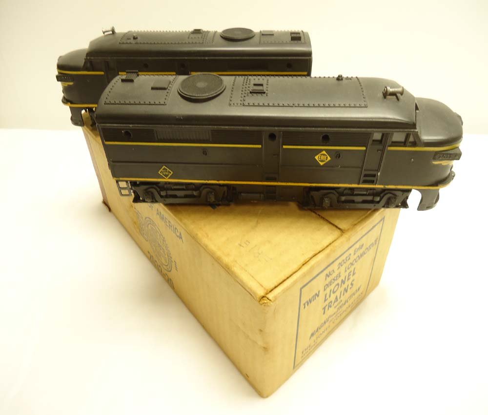 ABT: Nice Lionel #2032 Erie Alco AA Diesels/Brick : Paul V. Ambrose and Drew J. Bauer present: These are the #2032 Erie Alco AA Diesels with Magnetraction and Horn that Lionel made circa 1952. Early variation without dime-sized "Domes" on roof. Our Opi