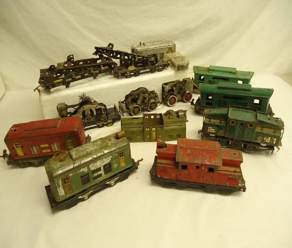 ABT: Lionel/Ives Assortment Electrics/Frames/Motor: Paul V. Ambrose and Drew J. Bauer present: This is an assortment of eight Electrics (some Cabs only) plus Frames, Motors, and Miscellany as pictured that Lionel and Ives made Pre War. What is shown is