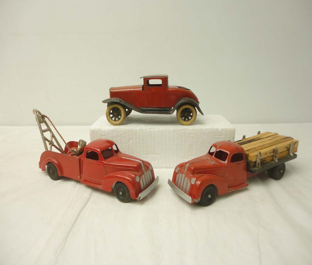 ABT: 3 Assorted Hubley Vehicles: Paul V. Ambrose and Drew J. Bauer present: These are three assorted Vehicles that Hubley made in the past. Included are an approximate 8-inch Auto, 9-inch Tow Truck, and 10-inch Flat Bed w/Lumber. Wha