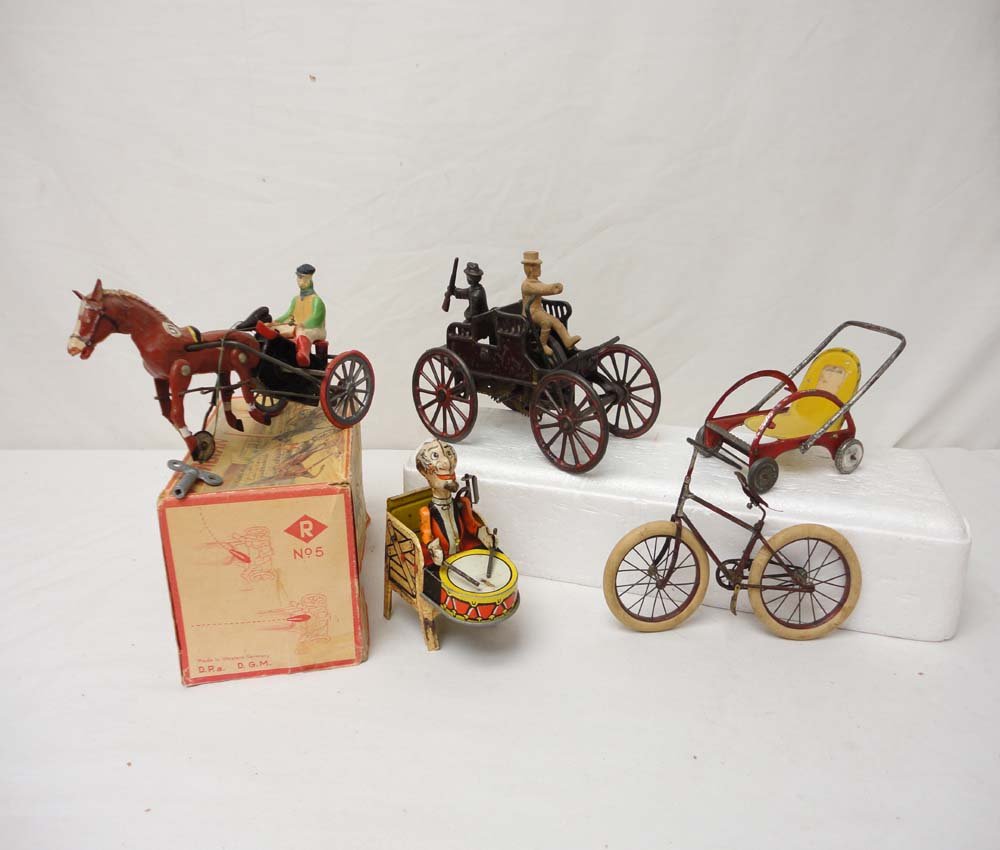 ABT: Unusual D.G.M. No. 5 Arabian & 4 Asst. Metal : Paul V. Ambrose and Drew J. Bauer present: This is a quite old and unusual Lot of 5 distinctly different metal Toys. Featured item is the German made D.G.M. No.5 'Arabian' Horse/Sulky/Jockey with OB a