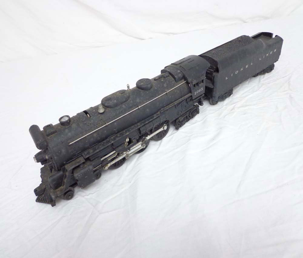 ABT: Lionel #2065/2046W Steam Engine & Tender: Paul V. Ambrose and Drew J. Bauer present: These are the #2065 Steam Engine and #2046W Whistle Tender that Lionel made in the middle 1950s. In dire need of cleaning from long-term display. Examine clo