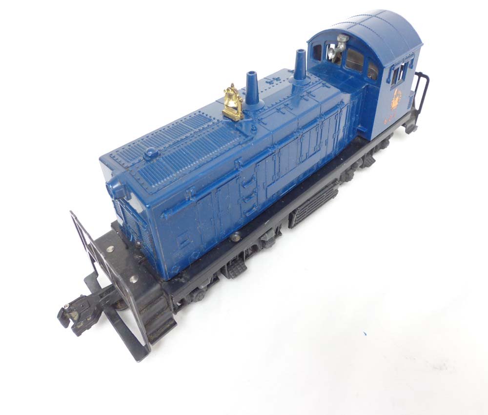 ABT: Lionel #621 Jersey Central Diesel Switcher: Paul V. Ambrose and Drew J. Bauer present: This is the #621 Jersey Central Diesel Switcher that Lionel made in the mid 1950s. Note cracks at screwhole. Examine closely; what is pictured is what you wi