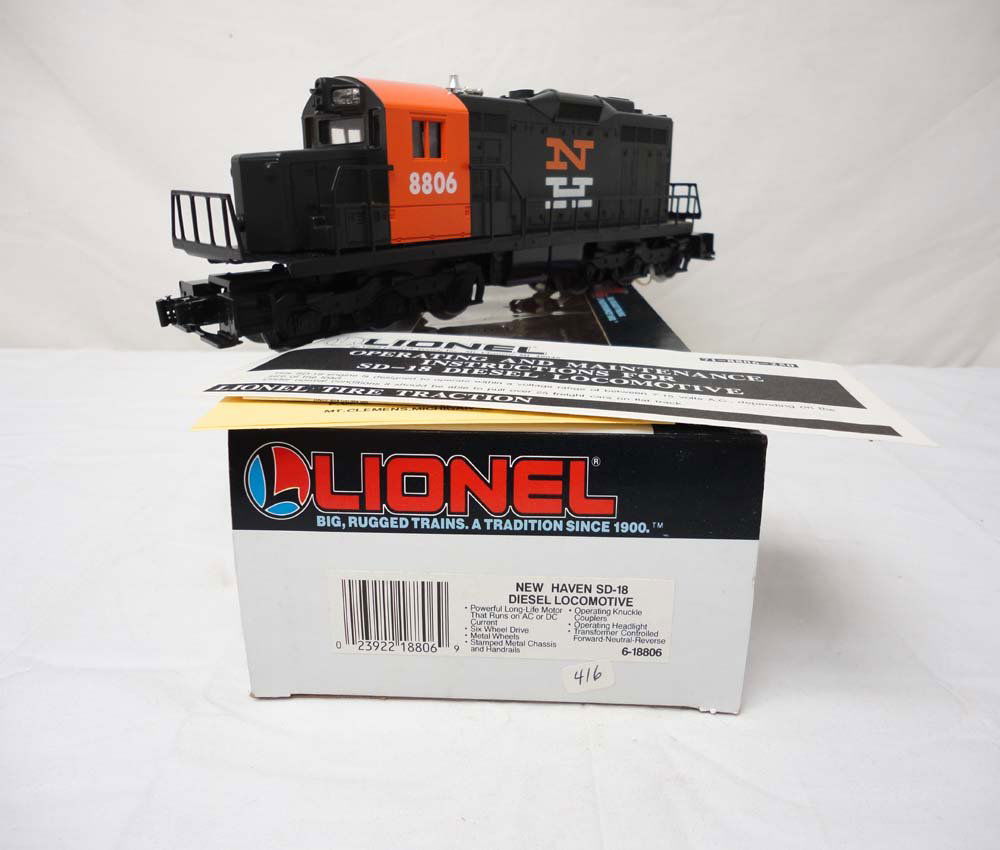 ABT: Mint Lionel #18806 New Haven SD-18 Diesel Loc: Paul V. Ambrose and Drew J. Bauer present: This is the #18806 New Haven SD-19 Diesel with Six-Wheel Drive that Lionel made in the 1990s. Our Opinion is that it is generally in Mint Condition. A Nice B