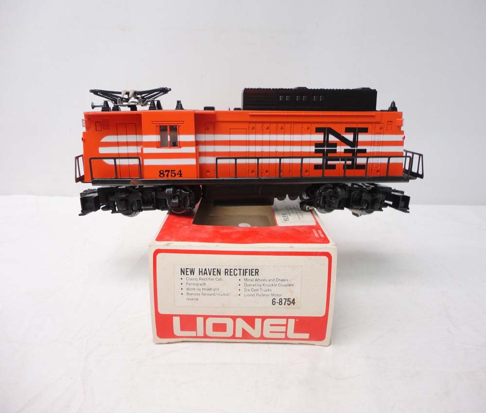 ABT: Lionel #8754 New Haven Rectifier/OB: Paul V. Ambrose and Drew J. Bauer present: This is the #8754 New Haven Rectifier that Lionel made in the 1970s. Our Opinion is that it is generally in Like New Condition, some rust. Original Box. All 
