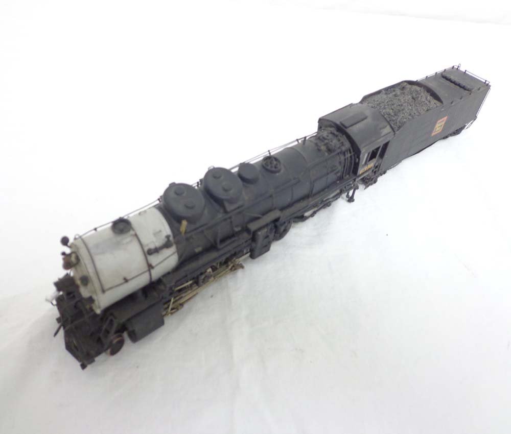 ABT: HO Brass KMT: Burlington 2-10-4 Steam E&T: Paul V. Ambrose and Drew J. Bauer present: This is the HO Brass Burlington 2-10-4 Steam Engine and Tender that KMT made some time ago. No Box. Examine closely; what is pictured is what you will receiv