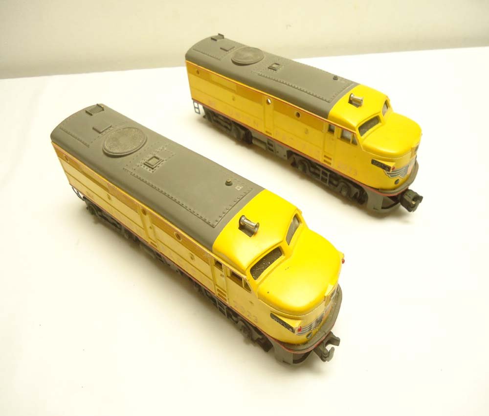 ABT: Lionel #2023 Yellow/Gray Union Pacific Alco A: Paul V. Ambrose and Drew J. Bauer present: These are the #2023 Union Pacific Alco AA Diesels with Magnetraction and Horn that Lionel made in 1950. Commonly referred to as the "Anniversary Alcos". Typi