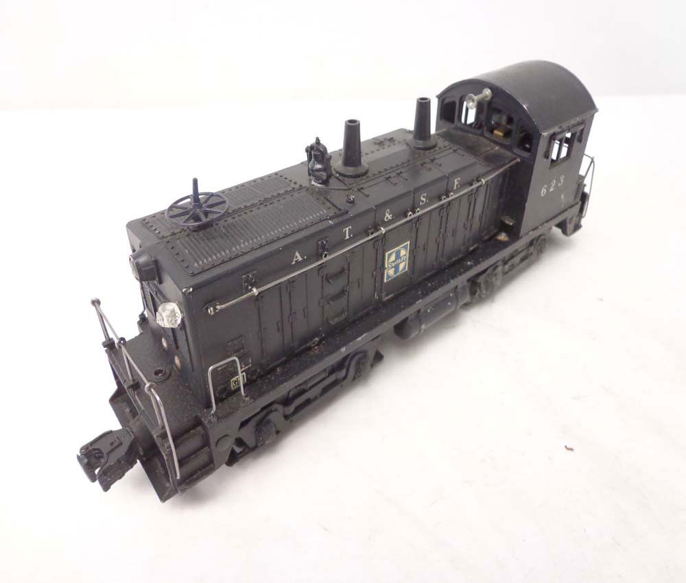 ABT: Lionel #623 ATSF Diesel Switcher: Paul V. Ambrose and Drew J. Bauer present: This is the #623 ATSF Diesel Switcher that Lionel made in the early 1950s. Our Opinion is that it is generally in Excellent Condition. Note one missing Marke