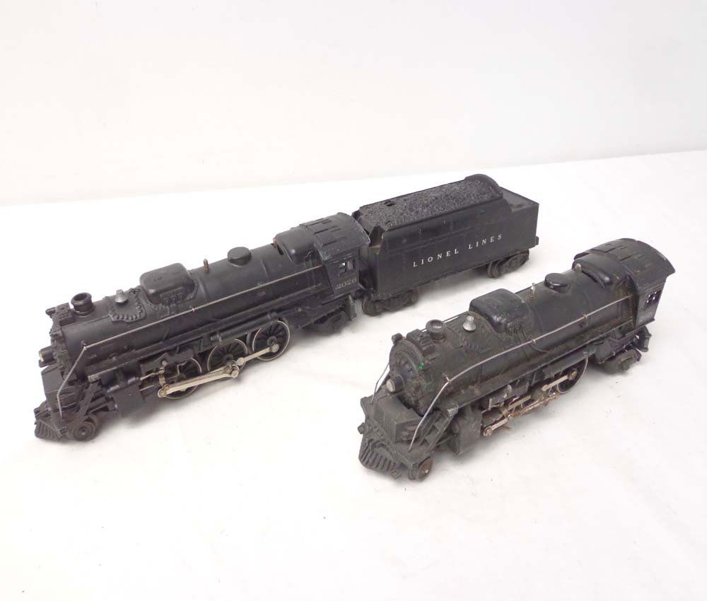 ABT: 2 Lionel #2026 Steam Engines and #6466W Tende: Paul V. Ambrose and Drew J. Bauer present: These are two #2026 Steam Engines and #6466W Tender that Lionel made circa 1950. Our Opinion is the Lot averages Excellent Minus Condition. No Boxes. Examine