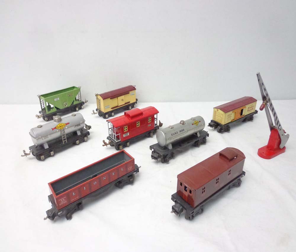 ABT: 8 Lionel Assorted Rolling Stock Items & Crossing G: Paul V. Ambrose and Drew J. Bauer present: These are the #1677 Gondola, #1680 Tank Car, #2679 Box Car, #1682 Caboose, #657 Caboose, #655 Box Car, #654 Tank Car, #653 Hopper and #152 Crossing Gate that