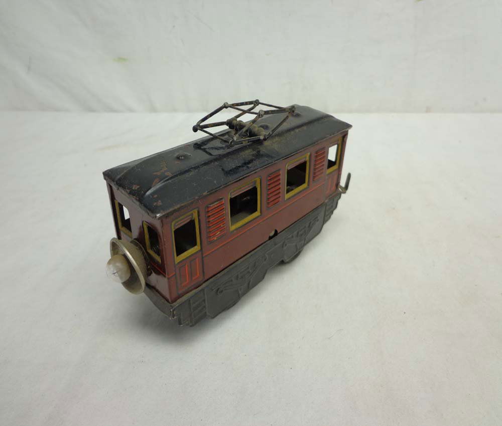 ABT: Unusual Karl Bub Electric Trolley: Paul V. Ambrose and Drew J. Bauer present: This is an unusual Tinplate Electric Trolley that Karl Bub of Nuremberg made sometime in the distant past. O Gauge. No Box. Examine closely; what is pictured