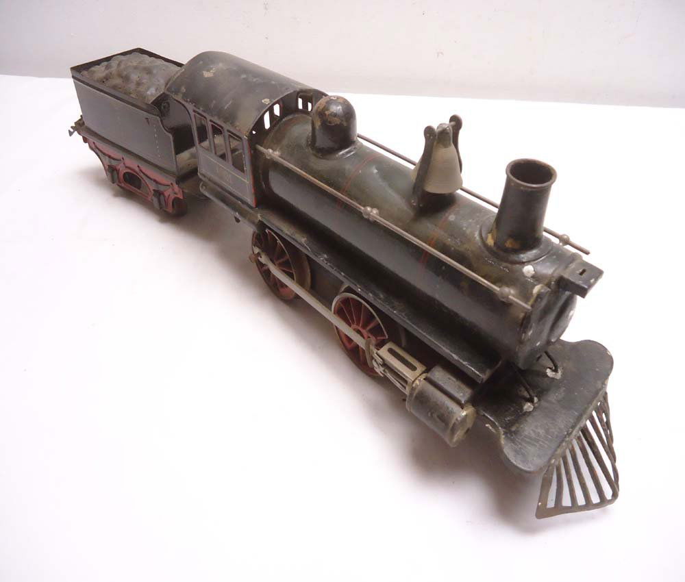 ABT: Marklin #1021 Clockwork Steam Engine & Tender: Paul V. Ambrose and Drew J. Bauer present: These are the #1021 Clockwork Steam Engine and Tender that Marklin made in O gauge some time in the distant past. No Boxes. Examine very closely; what is pic