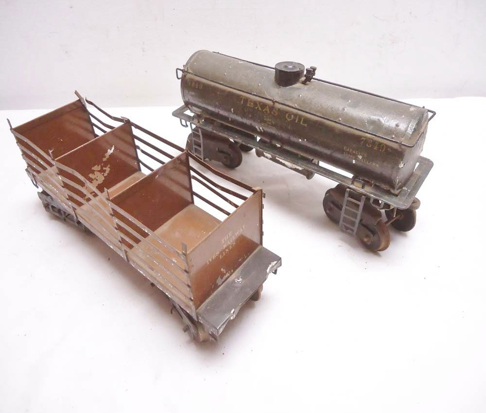 ABT: Ives #191 Flat Car & #7849 Texas Oil Tank Car: Paul V. Ambrose and Drew J. Bauer present: These are the #191 Flat Car (Standard) Gauge and the #7849 Texas Oil Tank Car (1 Gauge) that Ives made. Examine closely; what you see is what you will receiv