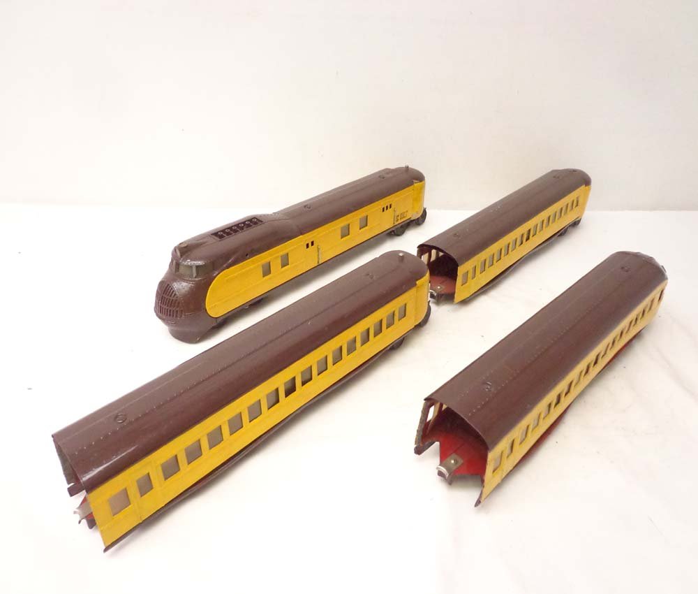 ABT: Lionel #752E/753/753/754 Streamline UP City of Por: Paul V. Ambrose and Drew J. Bauer present: This is the 4-unit #752E, two #753 and #754 Brown/Yellow Union Pacific, City of Portland Streamline Set w/3 Vestibules (repainted) that Lionel made in the la
