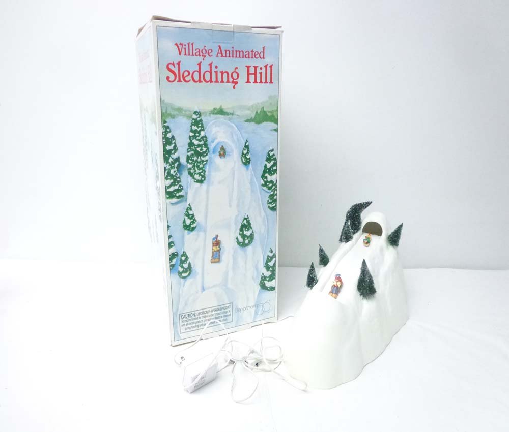 ABT: Department 56 Village Animated Sledding Hill/OB: Paul V. Ambrose and Drew J. Bauer present: This is the Village Animated Sledding Hill that Department 56 made a few years ago. Please review all pictures: what is shown is what you will receive. Our O