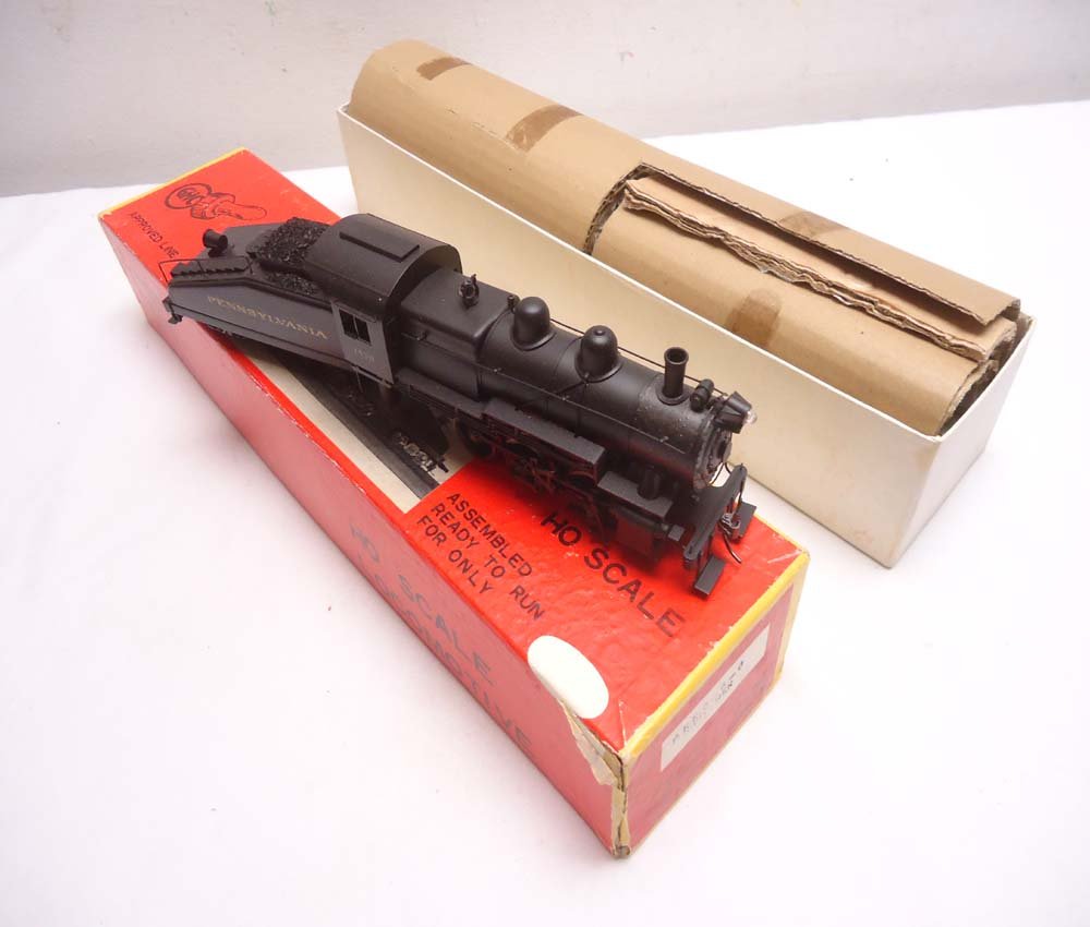 ABT: Brass HO Scale: HO Train Company PRR 0-6-0 Steam S: Paul V. Ambrose and Drew J. Bauer present: These are the Brass HO PRR Steam Switcher and Tender that The HO Train Company made in Japan some time in the past. Includes nice Original Box as shown. Exam