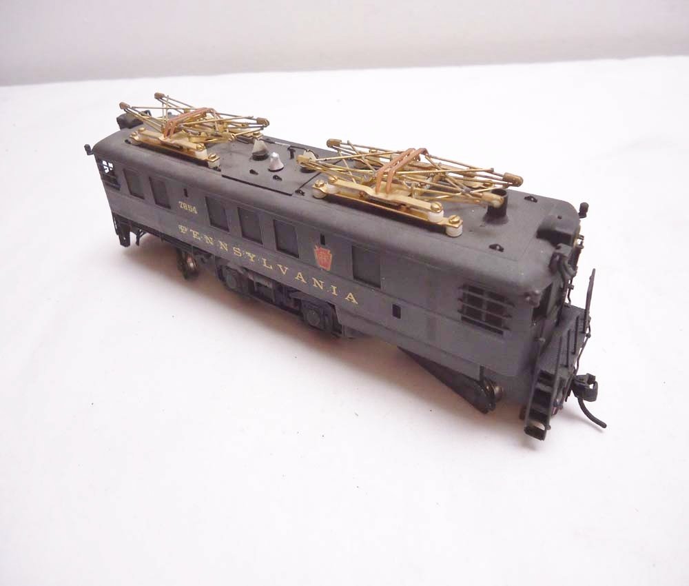 ABT: Brass HO Scale: Class 0-1 PRR 4-4-4 Electric: Paul V. Ambrose and Drew J. Bauer present: This is an interesting small Brass HO Class 0-1 PRR 4-4-4 Electric that was made in Japan some time in the past. No Box. Examine closely; what is pictured is