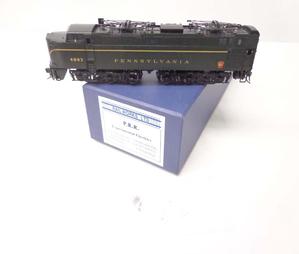 ABT: Brass HO Scale: Railworks Ltd. PRR E3c Experimenta: Paul V. Ambrose and Drew J. Bauer present: This is the Brass HO E3c PRR Experimental Electric that Railworks Ltd. imported some time in the past. Includes nice Original Box as shown. Examine closely; 