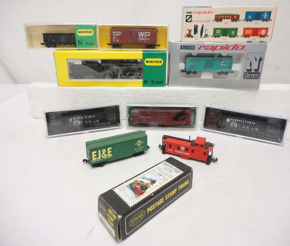 ABT: Aurora/AHM/Minitrix/MRC N Gauge: E/T & 8 Assorted : Paul V. Ambrose and Drew J. Bauer present: These are a Steam Engine & Tender and 8 Assorted Cars (MRC, #0415 EJ&E Box Car, #4887/230 PRR Caboose (no wheels), (2)#7050 PRR Hoppers, #4868 PRR Box car, #