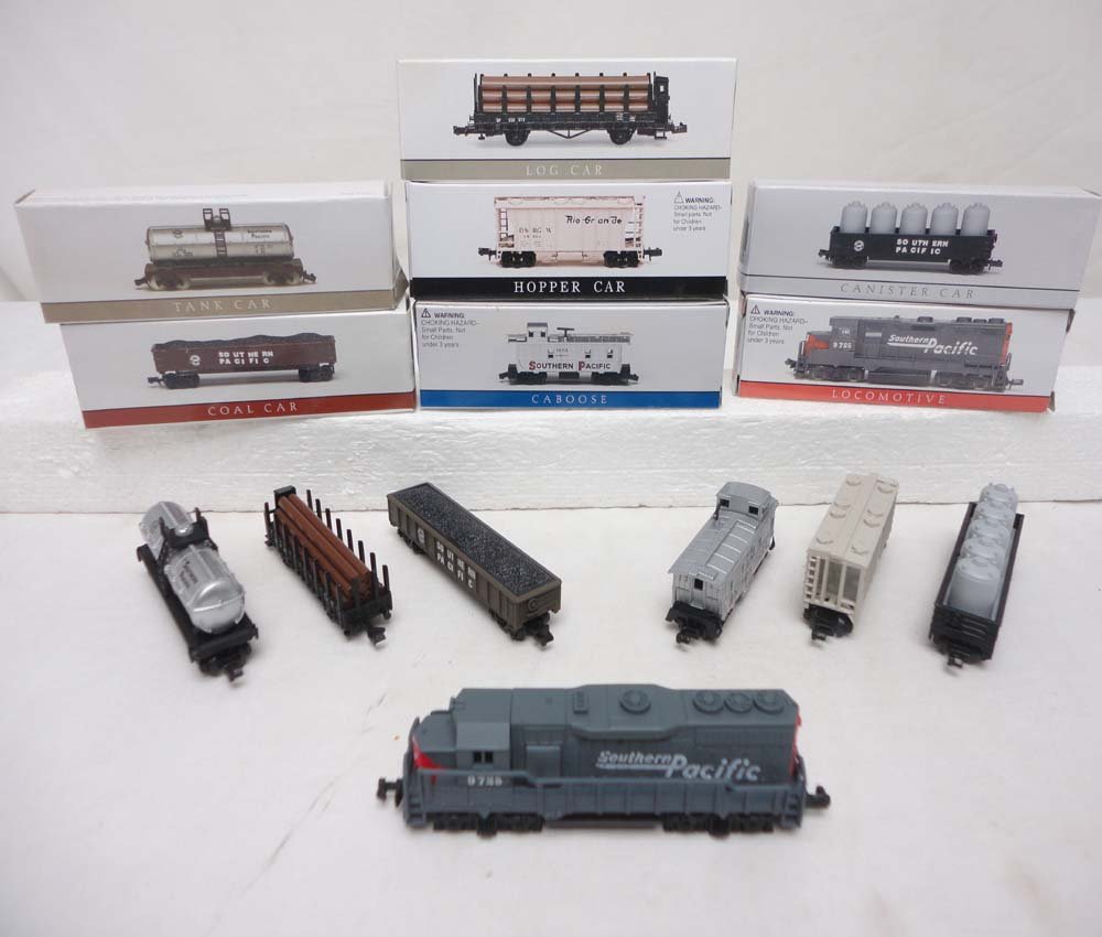 ABT: N Gauge: High Speed Metal Production Southern Paci: Paul V. Ambrose and Drew J. Bauer present: These are a Southern Pacific GP Diesel and Six Assorted Cars (#419 Tank Car, #422 Coal Car, #425 Hopper, #418 Engine, #423 Caboose, #426 Log Car, #420 Canist