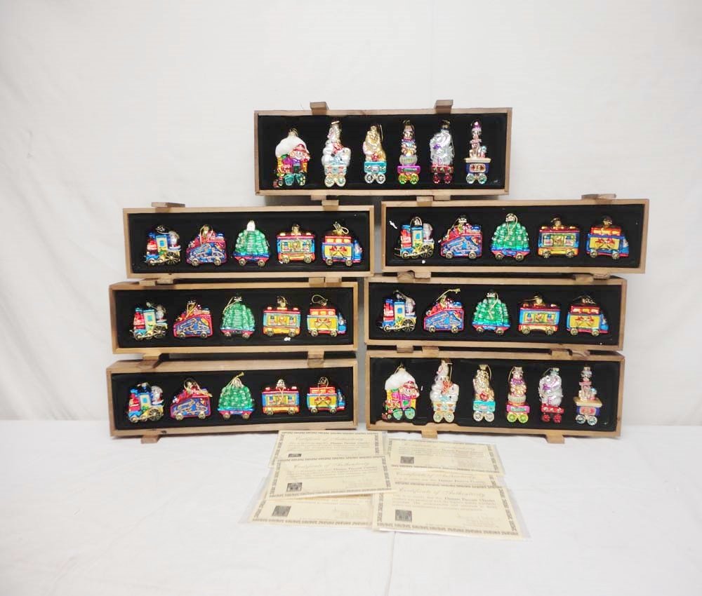 ABT: 7 Mint Thomas Pacconi Classic 2004 Collection of: Paul V. Ambrose and Drew J. Bauer present: These are seven Sets of Thomas Pacconi Classic 2004 Collection of Ornaments (five in each box). Included are five Santa Train Ornaments and two Circus Orname