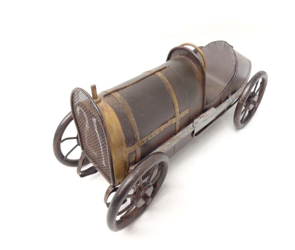 ABT: Unusual Sheet-Metal Antique Race Car: Paul V. Ambrose and Drew J. Bauer present: This is the unusual sheet-metal, boat-tail No. 21 Race Car by unknown Maker from long, long ago. This example measures approx. 12" long as shown. No Box. Exa