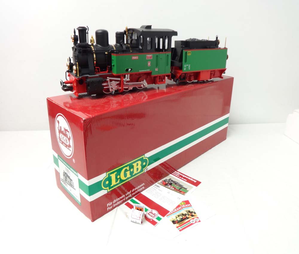 ABT: Mint LGB G Scale: #22261 Engine & Tender/OB: Paul V. Ambrose and Drew J. Bauer present: These are the #22261 Engine & Tender that LGB made for G Scale a few years ago. Our Opinion is that they are generally in Mint Condition. Original Box. All O