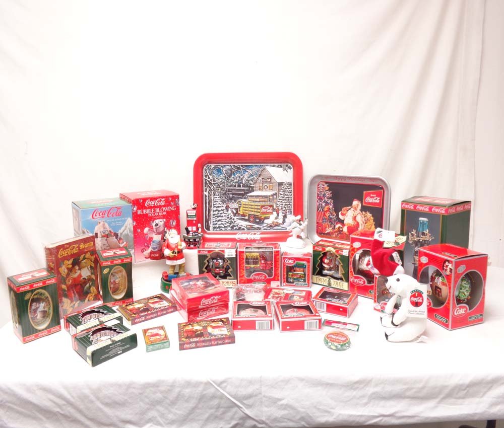 ABT: 30+ Assorted Coca Cola/Enesco Christmas Coke: Paul V. Ambrose and Drew J. Bauer present: These are thirty plus Assorted Coke Cola/Enesco Christmas Collectibles that were made a few years ago. Examine very closely; what is pictured is what you wil